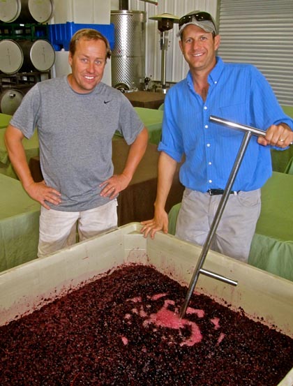 Harney Lane proprietor Kyle Lerner and winemaker Chad Joseph with a fermenting batch from their reserve zin planting (Lizzy James), picked this past Saturday (11/18)