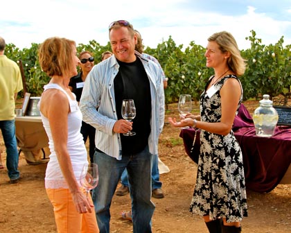 Late August: Estate Crush owners Sandy Sikeotis, and Bob & Ali Colarossi at Bokisch Ranches' harvest party