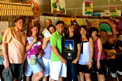 Returning the love at McCay Cellars, the “Lemcke contingent” from Vancouver gift Mike and Linda McCay (center) with a commemorative plaque… 