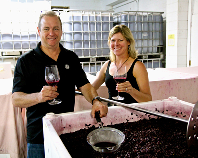 Estate Crush’s Bob and Alison Colarossi, tasting their estate grown Stellina Zinfandel, just finishing native yeast open top fermentation on September 5th