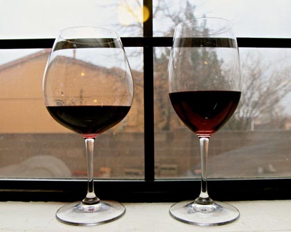 Comparison of bowl shaped “Burgundy” glass (on left; ideal for Pinot Noirs) with traditional tulip shaped glass (ideal for white wines and reds wines such as Zinfandel and Cabernet Sauvignon)