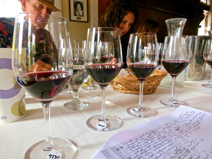 Professional wine judges taking meticulous notes