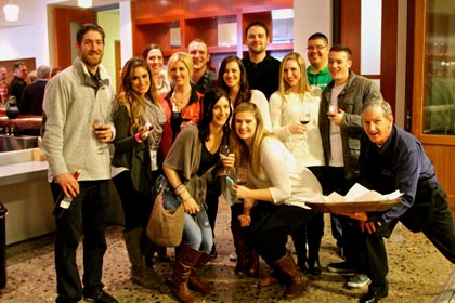 Group shot in LangeTwins winery Press Room…