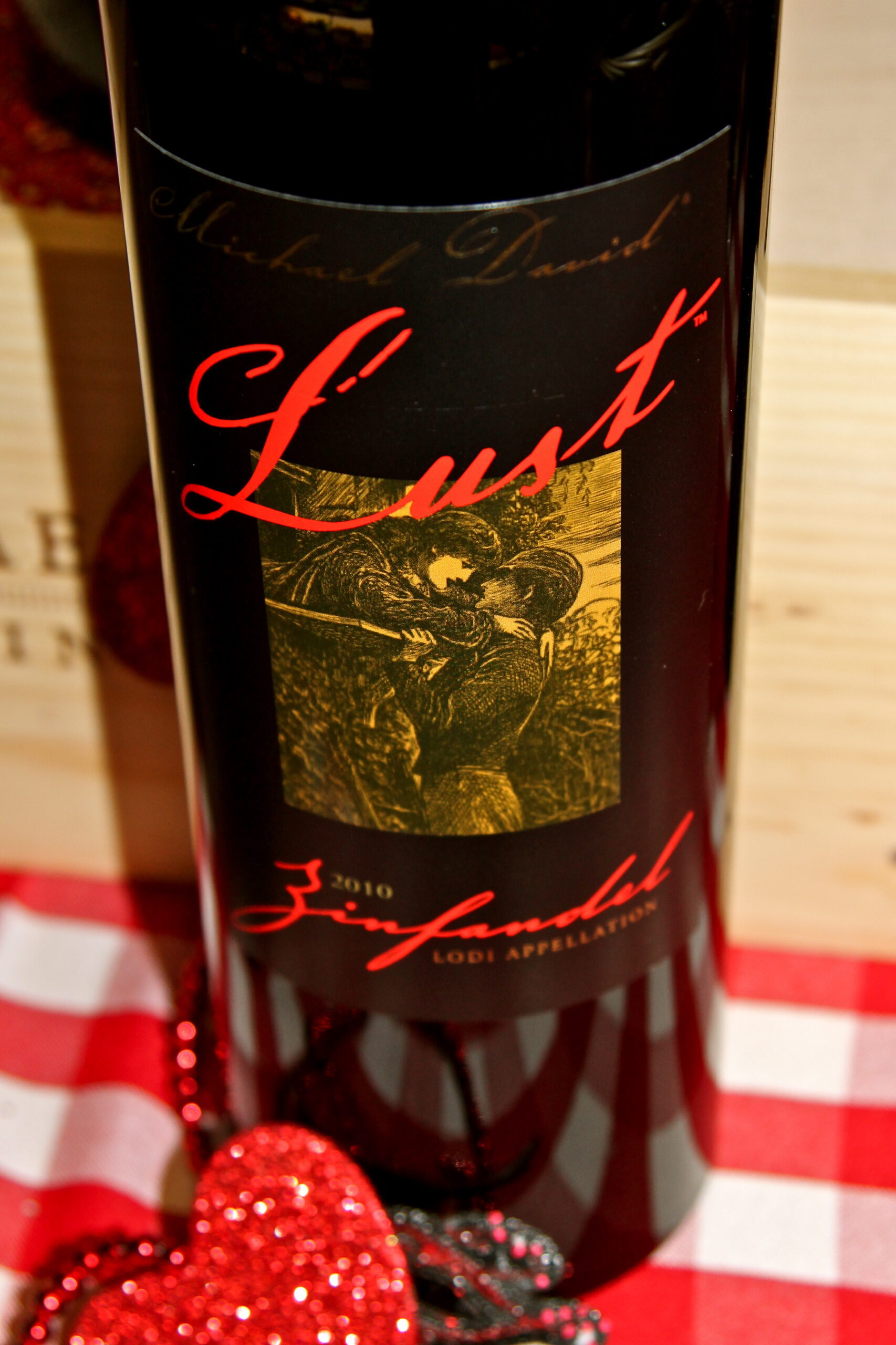 Close-up of a wine bottle label from Lodi Winegrape Commission, featuring a vintage design and a red and black color scheme.