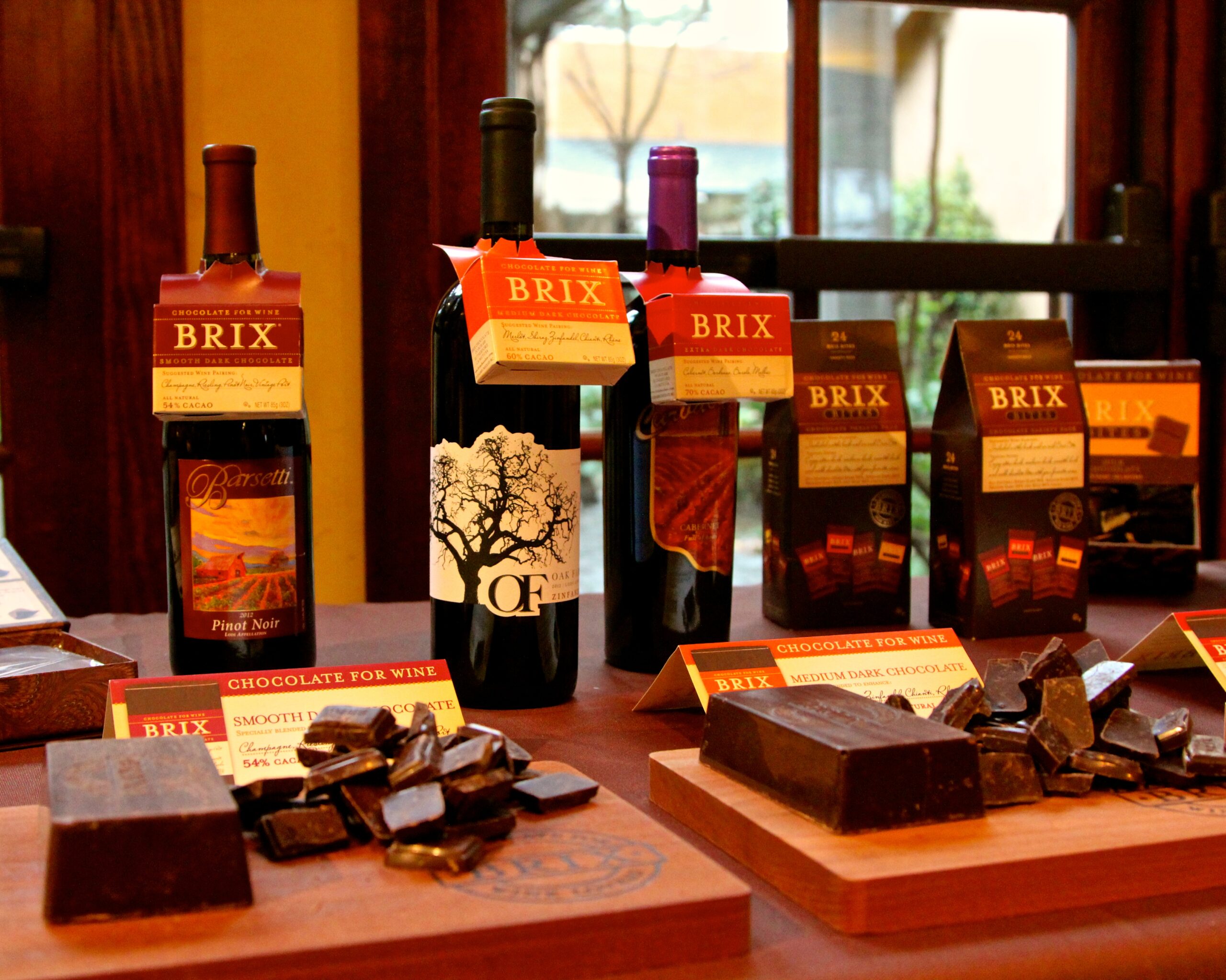 Selection of Brix wine bottles and chocolates on display at Lodi Winegrape Commission event.