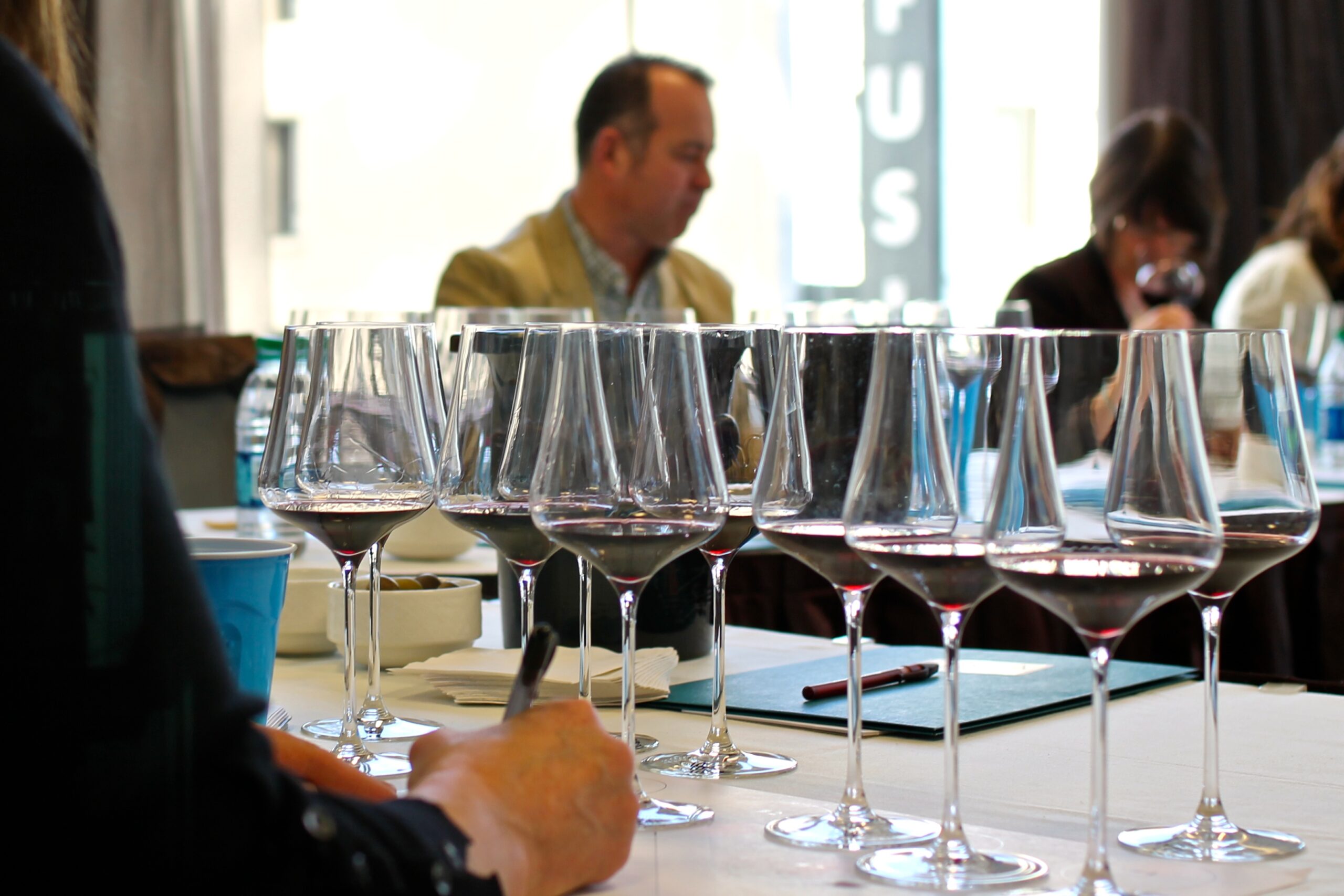 Wine glasses on a table during a tasting event hosted by the Lodi Winegrape Commission.