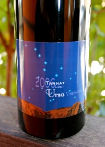 Close-up of a Lodi Winegrape Commission wine bottle label with a starry night design.