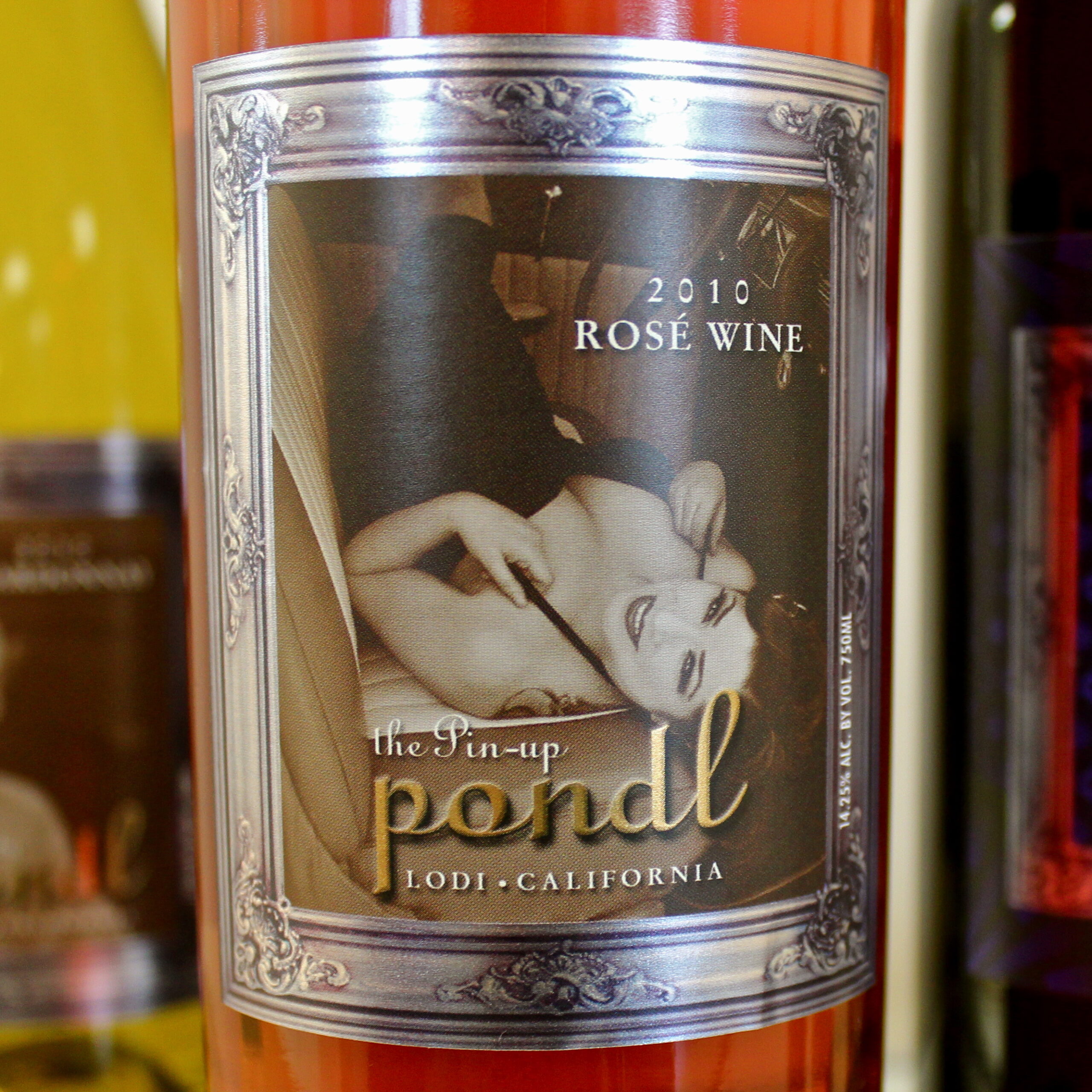 Close-up of 2010 Lodi Rosé wine bottle label with vintage and brand details.