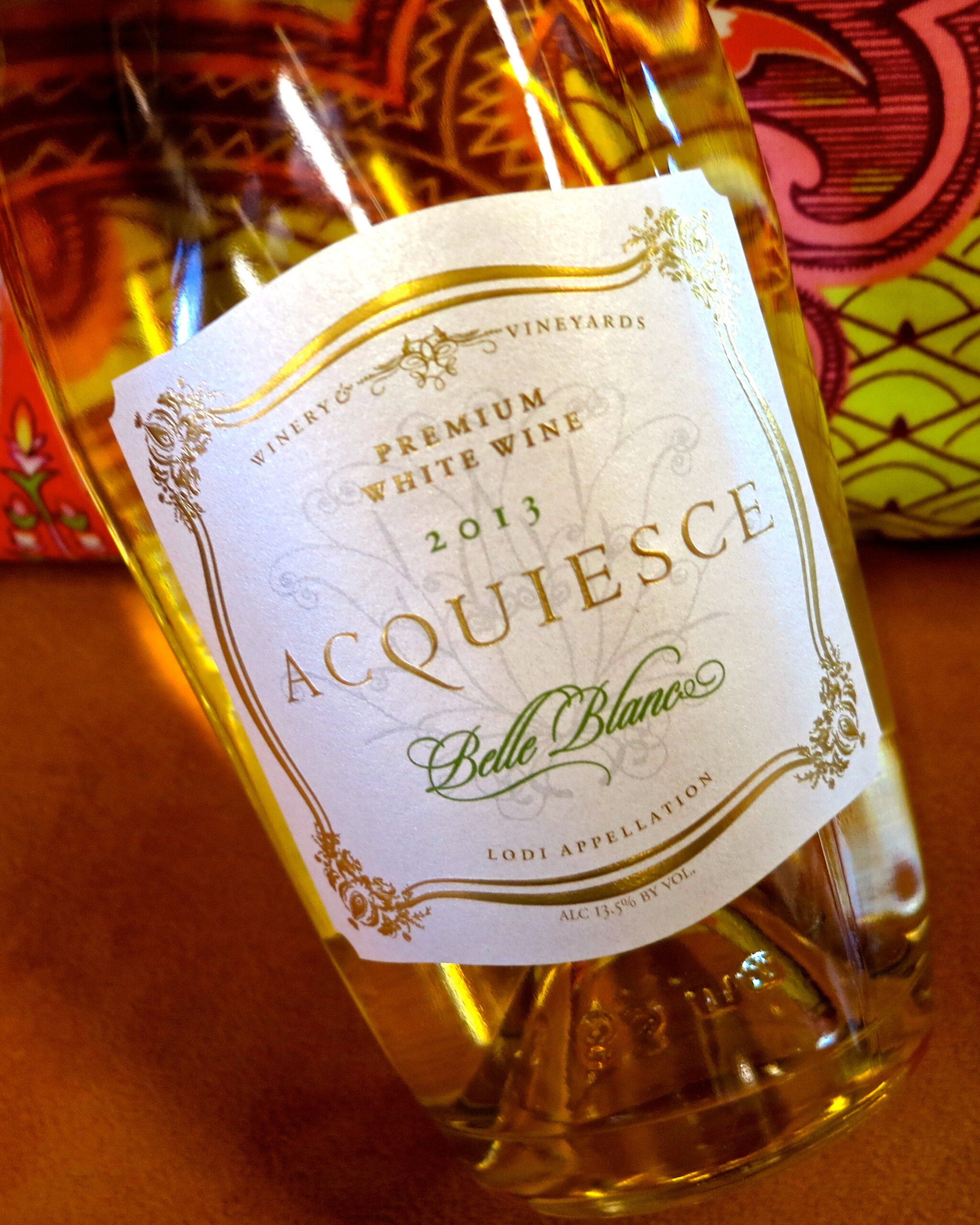 Glass of Acquiesce Belle Blanc 2013 white wine from Lodi Winegrape Commission.
