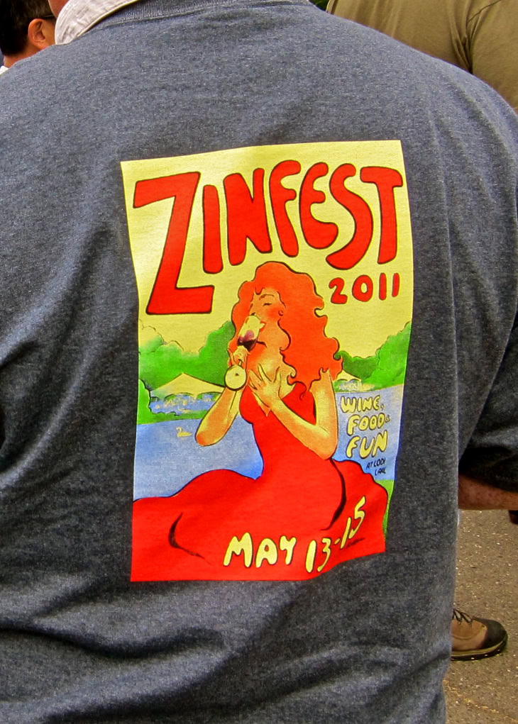 Colorful poster for Zinfest 2011 wine festival featuring a woman drinking wine.