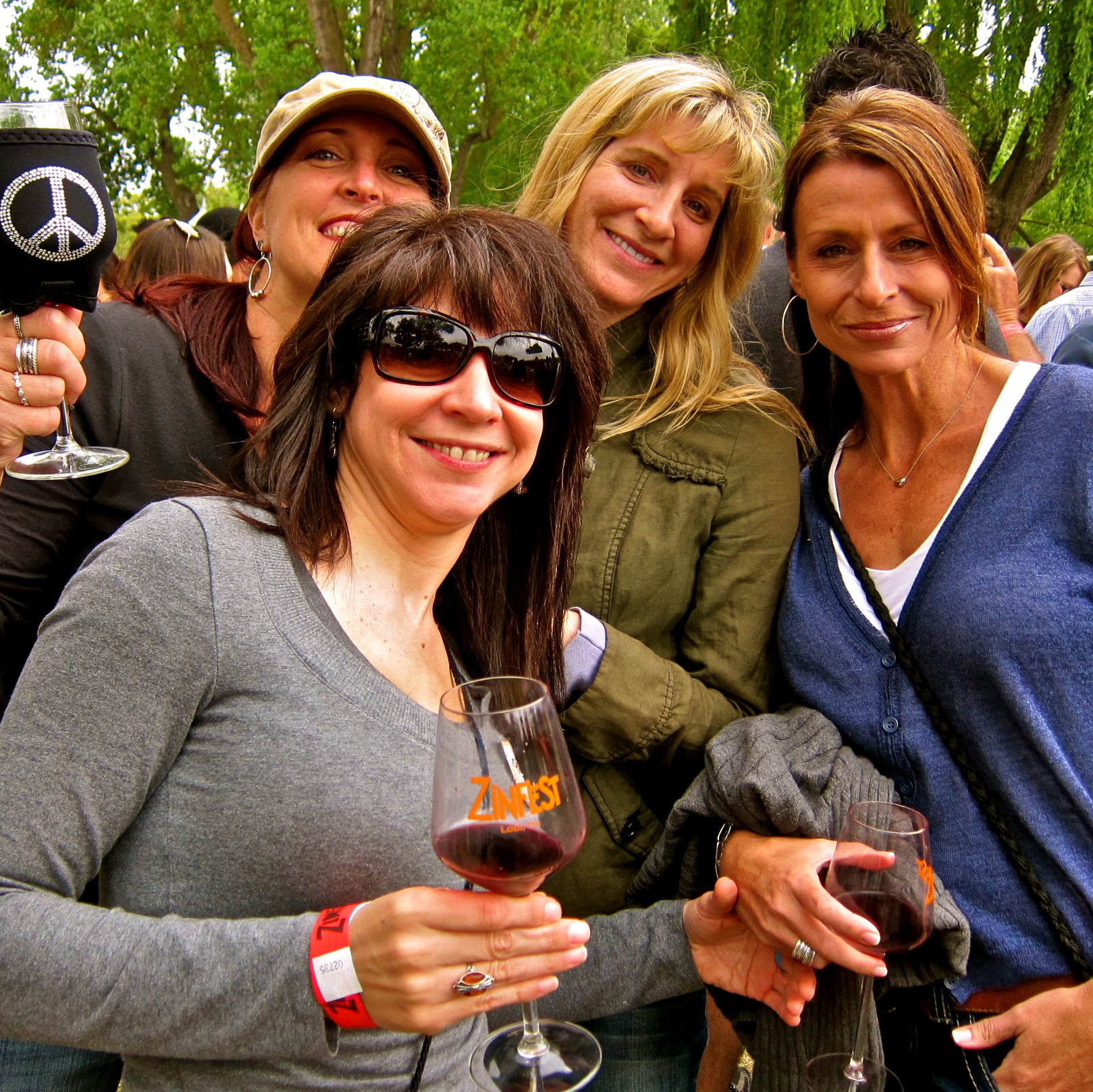 Group of women enjoying wine tasting at Lodi Winegrape Commission event.