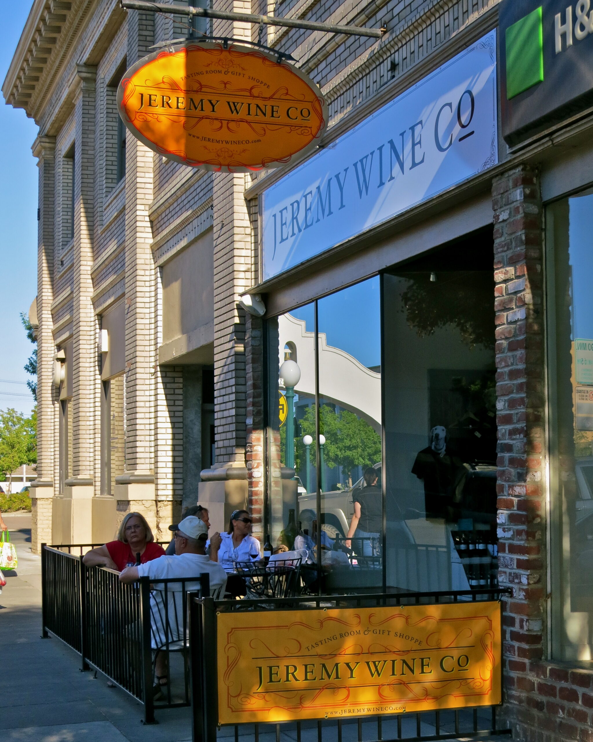 Jeremy Wine Co storefront with outdoor seating in Lodi, California, showcasing a vibrant wine shop exterior.