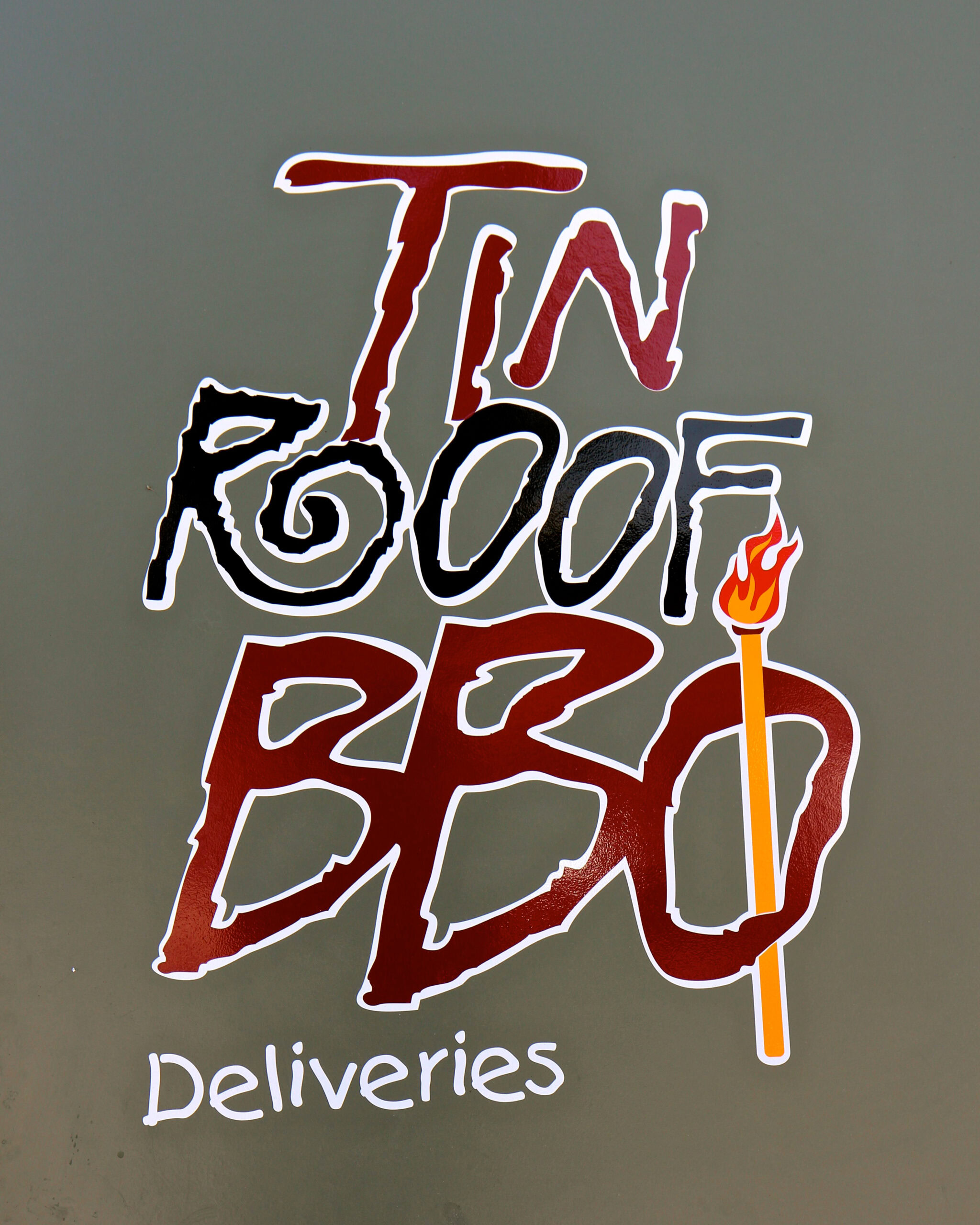 Tin Roof BBQ Deliveries logo with stylized text and a flame-tipped skewer.