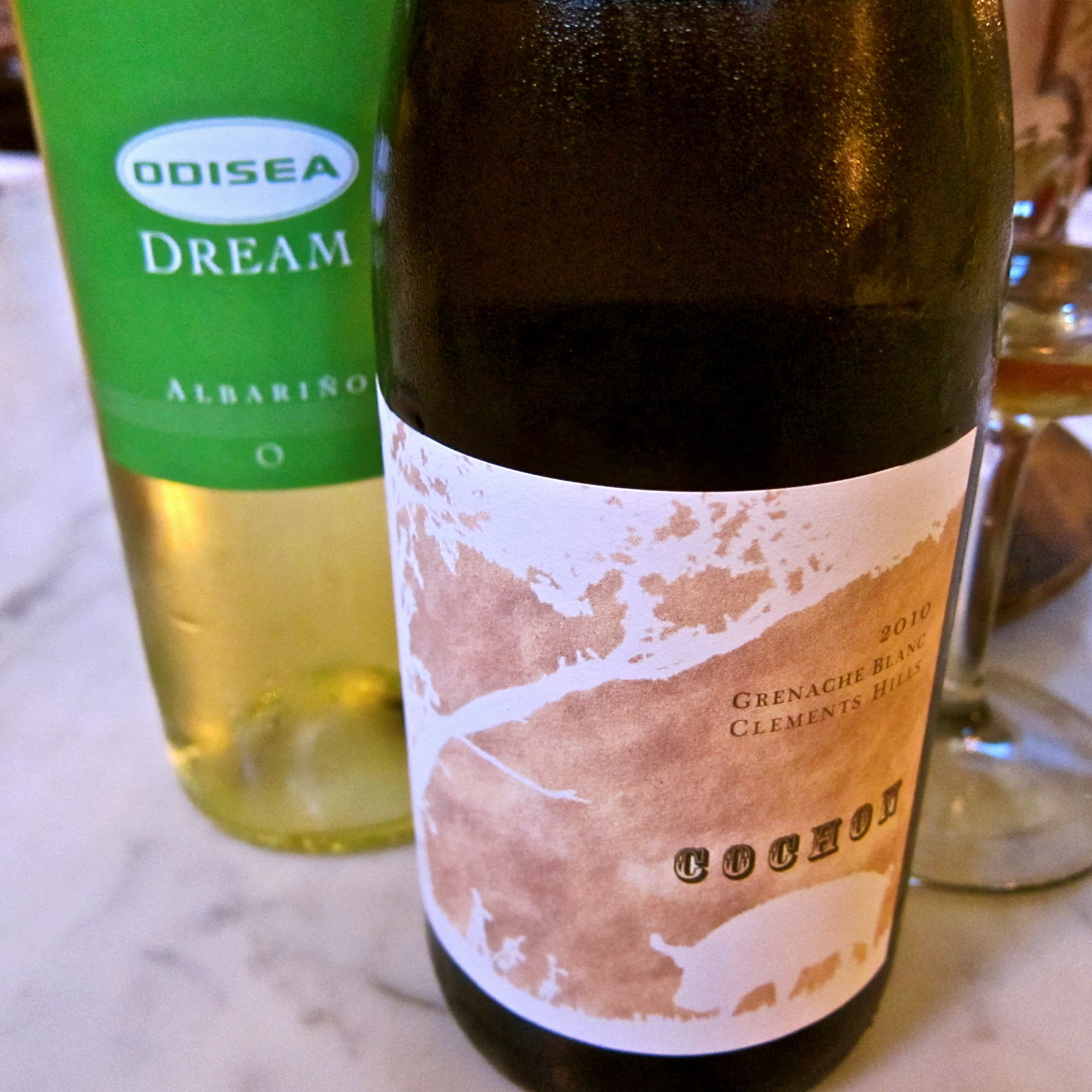 Close-up of a wine bottle from Lodi Winegrape Commission, showcasing a modern label design.