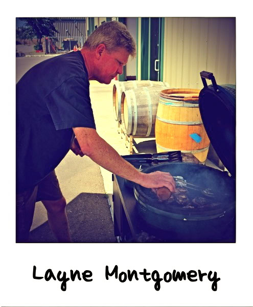 Winemaker Layne Montgomery grilling steaks outdoors at Lodi Winegrape Commission event.