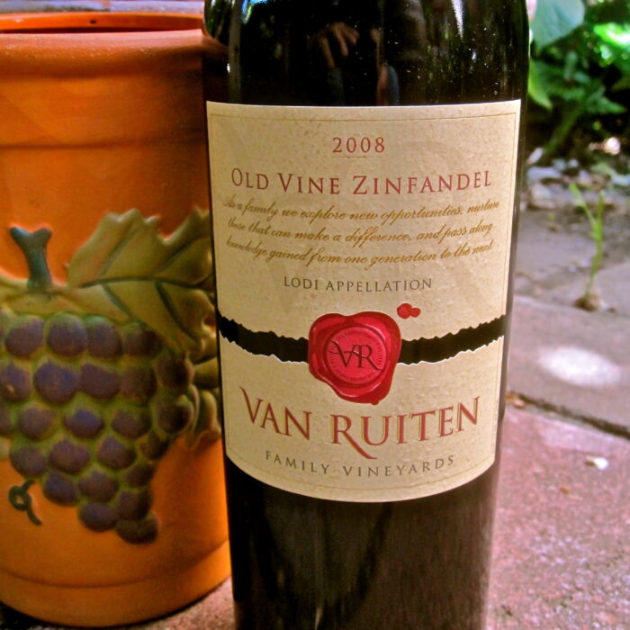 2008 Old Vine Zinfandel wine bottle from Van Ruiten Family Vineyards, Lodi, California, with grapevine pot in background.