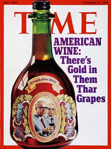 Time magazine cover featuring a wine bottle with a photo of Ernest and Julio Gallo, grapes, and wine-related imagery.