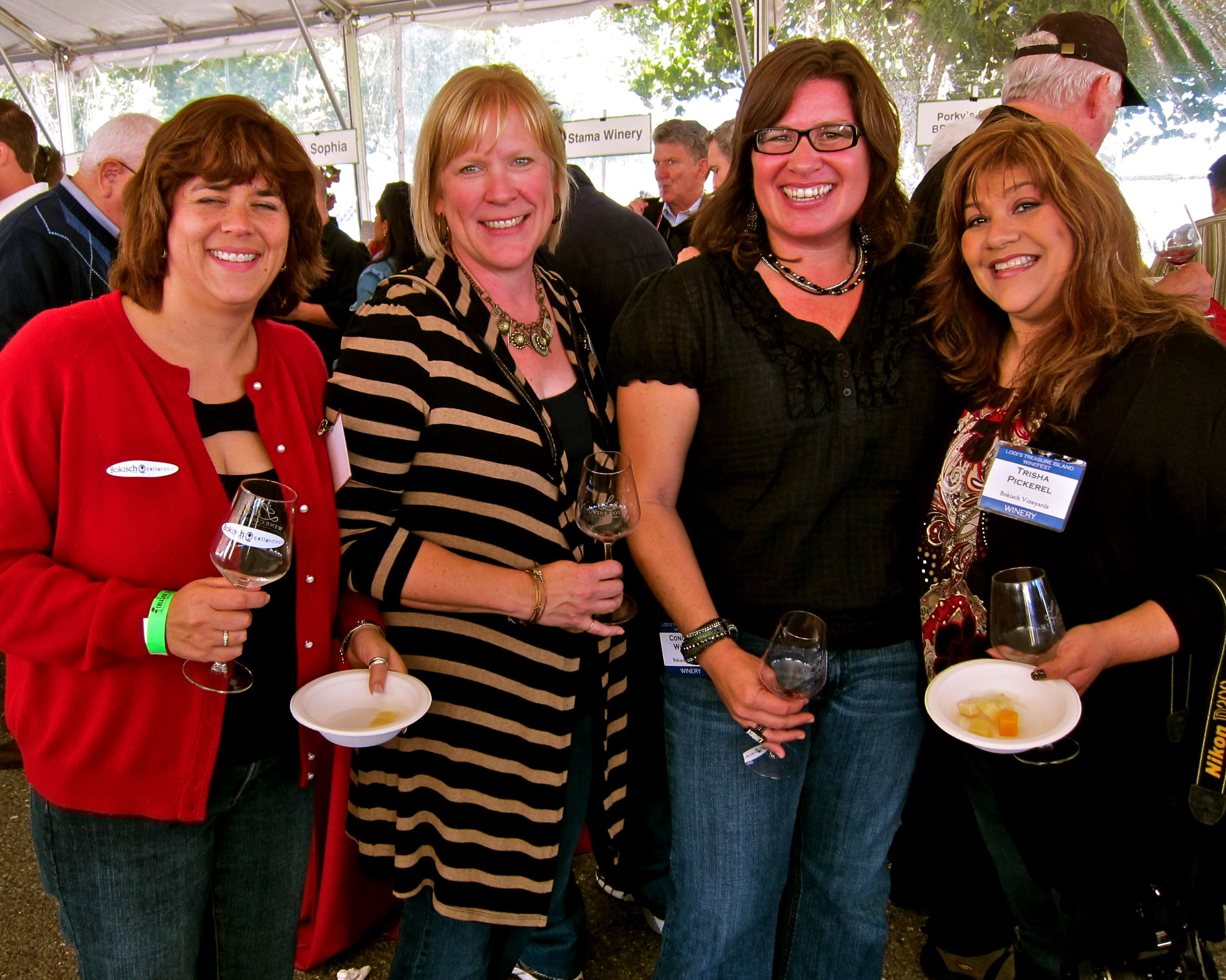 Group of women enjoying wine at Lodi Winegrape Commission event.