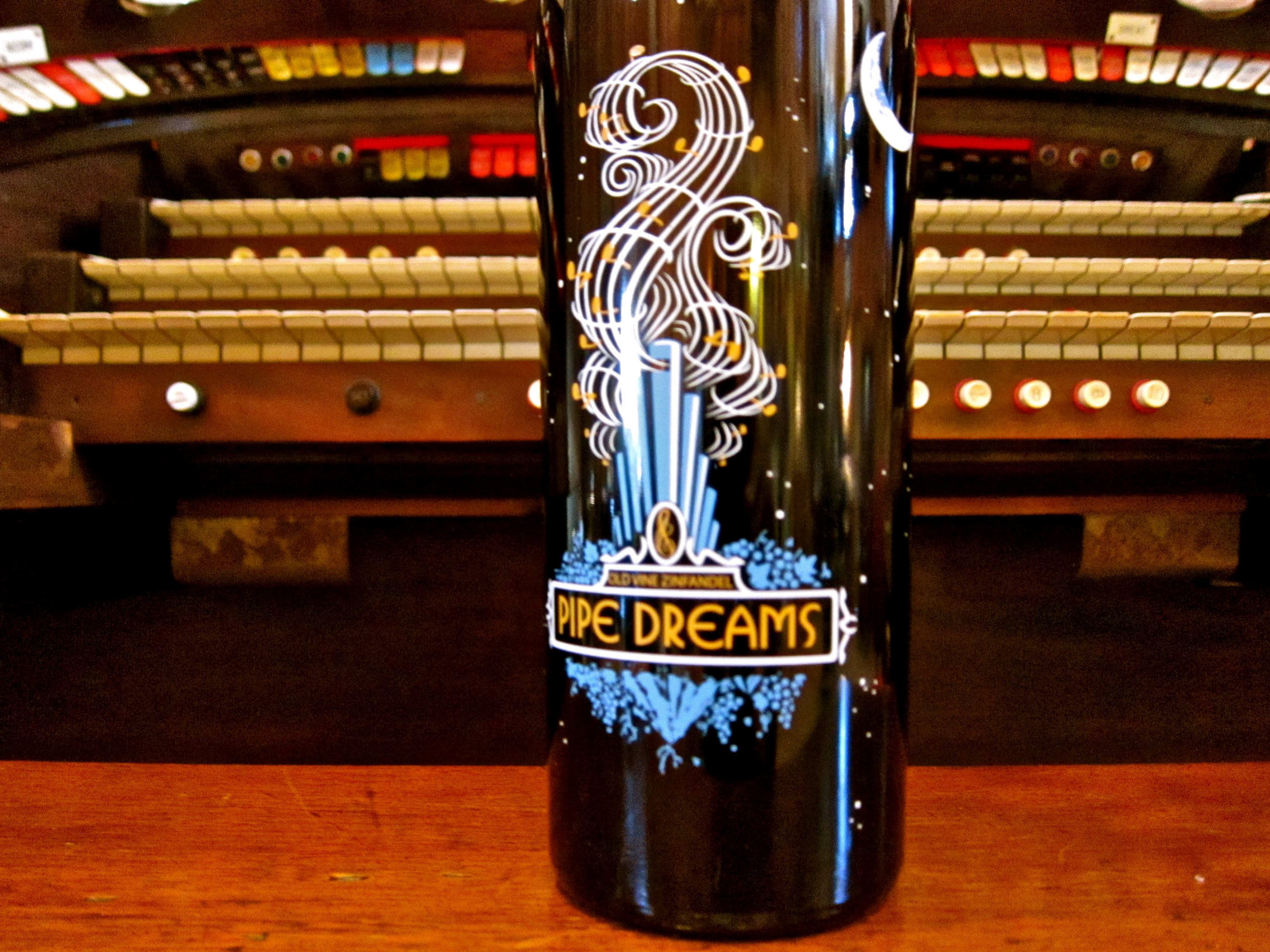 Lodi Winegrape Commission wine bottle with artistic label design in a wine shop.