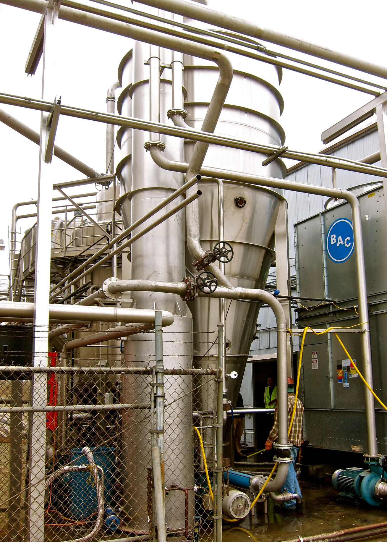 Industrial stainless steel equipment at Lodi Winegrape Commission facility for wine production.