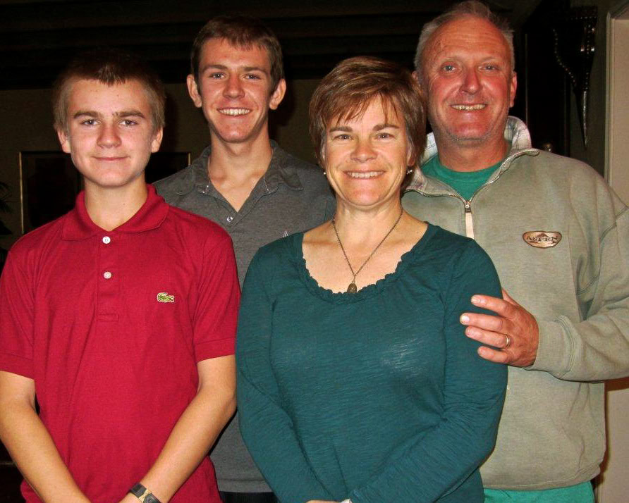 Family photo at Lodi Winegrape Commission event showcasing local wine industry members.