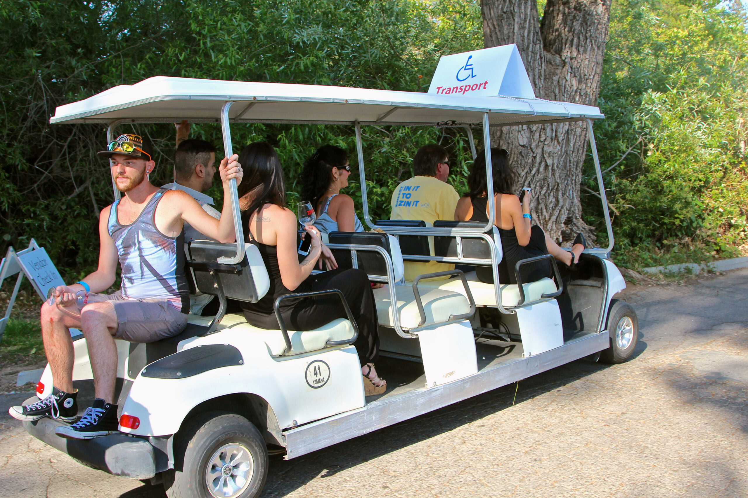 Tour vehicle with visitors at Lodi Winegrape Commission, exploring local vineyards and wine production.
