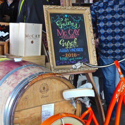 Colorful chalkboard sign at Lodi Winegrape Commission showcasing 2016 vintage and wine details.