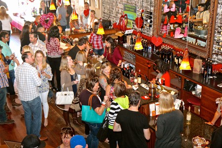 Crowd of people at a wine tasting event organized by the Lodi Winegrape Commission.