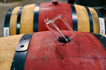 Wine barrel with a glass spout for tasting wine at Lodi Winegrape Commission.