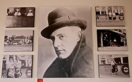 Black and white portrait of a man wearing a bowler hat, surrounded by vintage photographs and storefront images.
