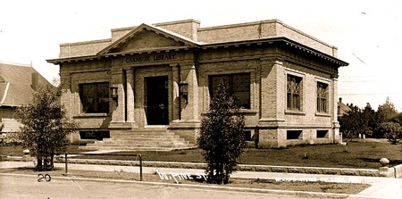 Historic Lodi Winegrape Commission building with classical architecture and steps leading to entrance.