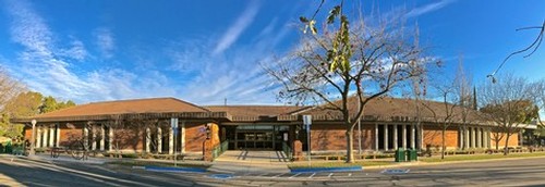 Lodi Winegrape Commission office building with trees and clear blue sky in Lodi, California.