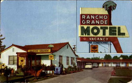 Vintage Rancho Grande Motel sign in Lodi, California, promoting lodging and air conditioning services.