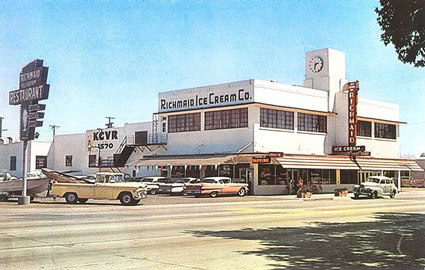 Historic Richmond Ice Cream Co. building in Lodi, California, with vintage cars parked in front and a clear blue sky.