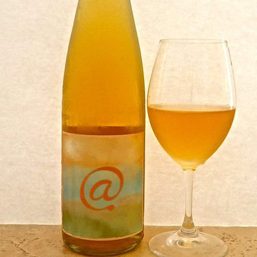 Bottle and glass of Lodi wine showcasing local wine production and quality.