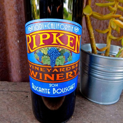 Lodi California Ripken Winery wine bottle with colorful label and grape design.