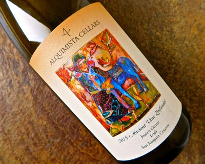 Close-up of a wine bottle label from Lodi Winegrape Commission, featuring colorful artwork and vintage details.