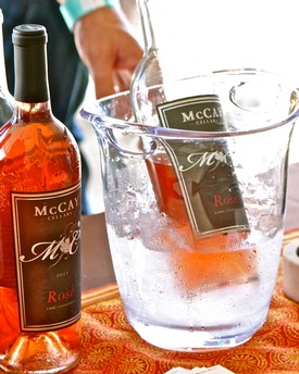 Bottle of McCay Cellars Rosé wine chilling in ice bucket at Lodi Winegrape Commission event.
