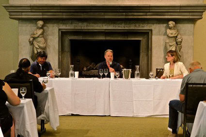 Panel discussion at Lodi Winegrape Commission event with speakers and audience members.