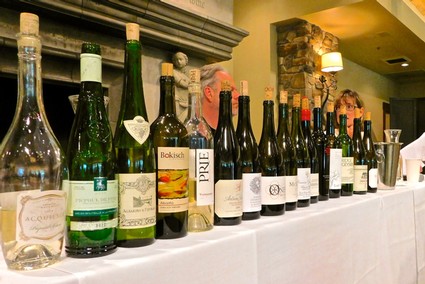Selection of wine bottles from Lodi Winegrape Commission on display at a tasting event.