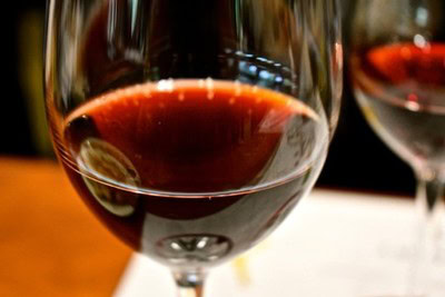 Close-up of a glass of red wine showcasing rich color and clarity, representing Lodi wine region.