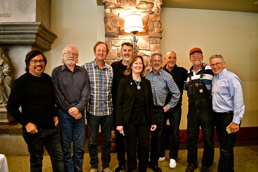 Group photo of Lodi Winegrape Commission members at a wine event in Lodi, California.