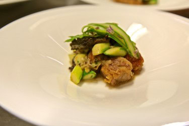 Gourmet dish featuring fresh vegetables and meat, highlighting Lodi Winegrape Commission's culinary offerings.