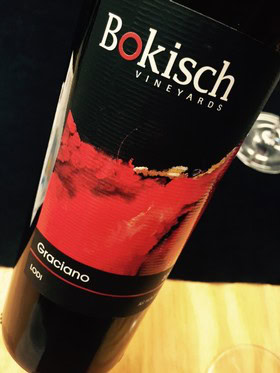 Bokisch Vineyards Graciano wine bottle with red and black label, close-up shot.