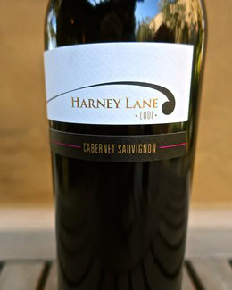 Close-up of Harney Lane Cabernet Sauvignon wine bottle with label in focus, showcasing the wine's branding and origin.