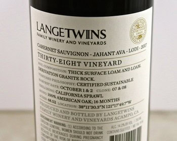 Close-up of a wine bottle label from Langetwins Family Winery showcasing Cabernet Sauvignon from Lodi, California.