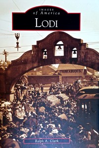 Vintage photo of Lodi Winegrape Commission event with crowd and historic architecture.