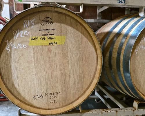 Wooden wine barrel labeled for 2019 Cabernet Franc from Lodi wine region, aged 36 months.