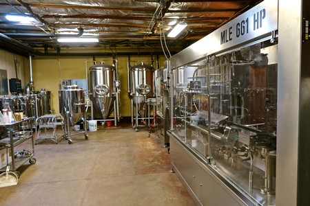 Winery equipment and fermentation tanks at Lodi Winegrape Commission facility.