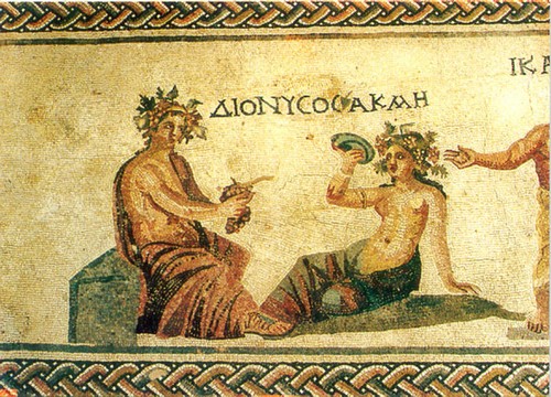Ancient mosaic depicting Dionysus and a satyr, showcasing Greek mythology art and historical craftsmanship.